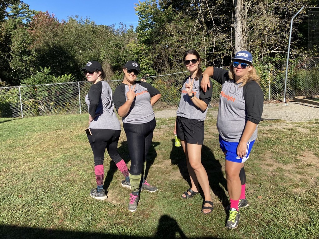 Honey Badgers teammates in team shirts before a game