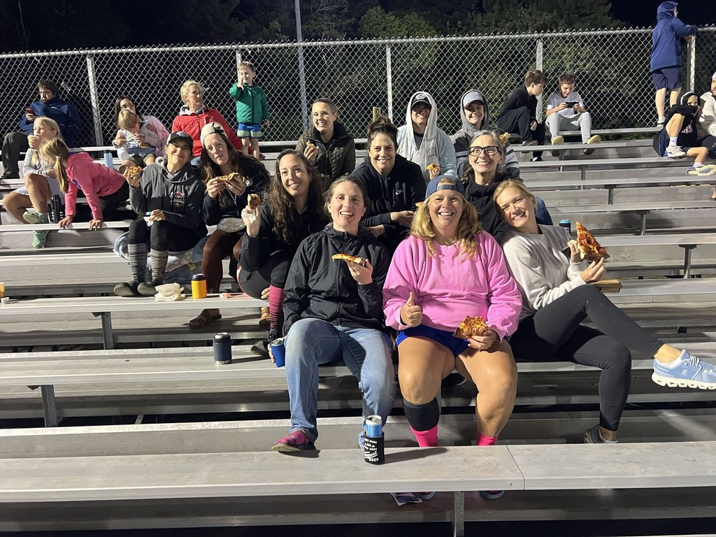 Honey Badgers families gathered at the field